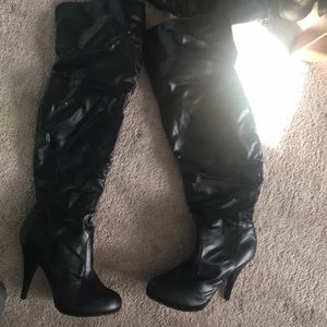 Over the knee black boots